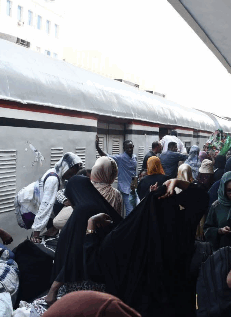Sudanese refugees prepare to board a train from Cairo to Aswan, 24 August 2025 (c) Egypt State Information Service